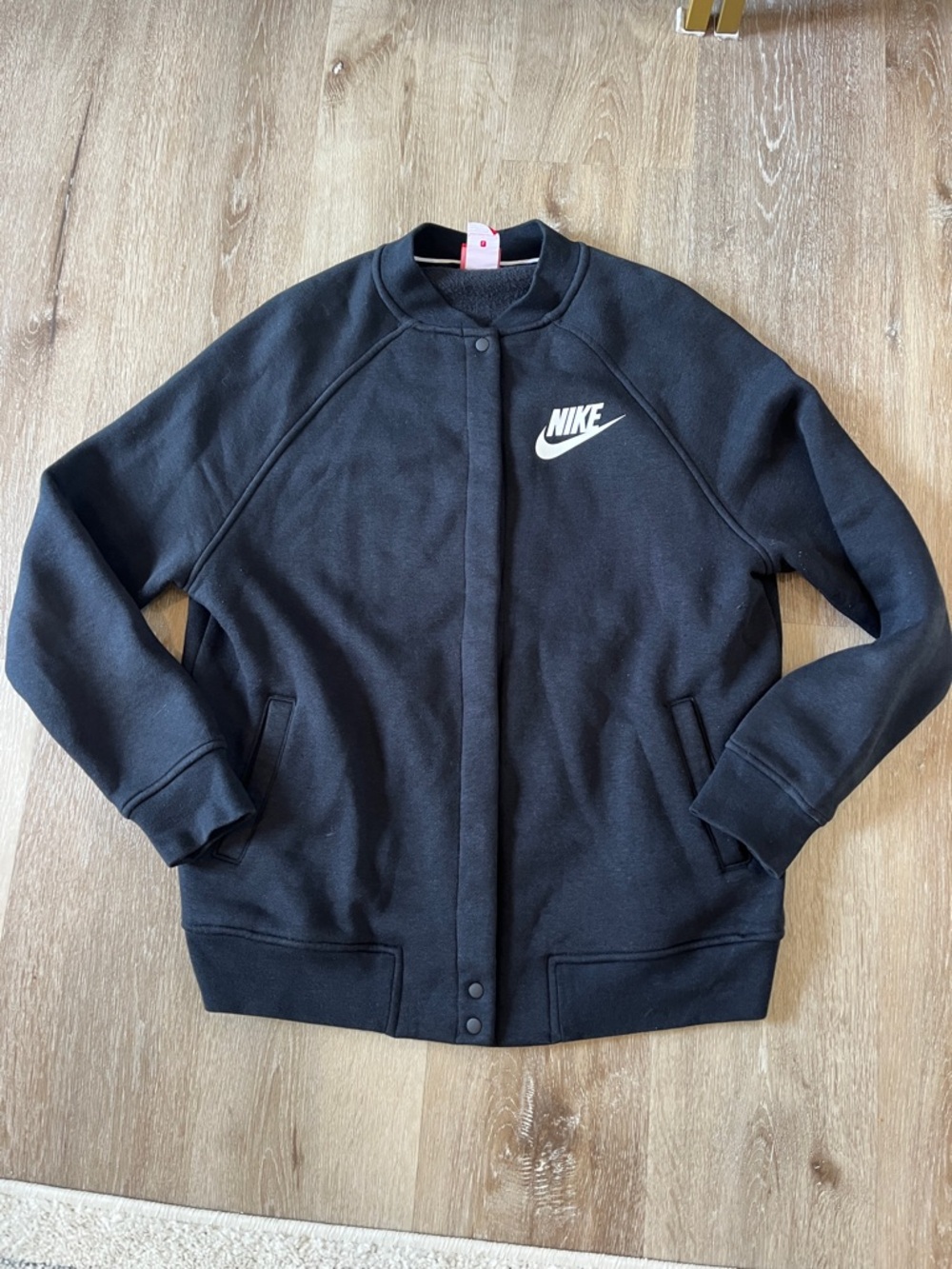 Nike Black Jacket with White Swoosh Logo